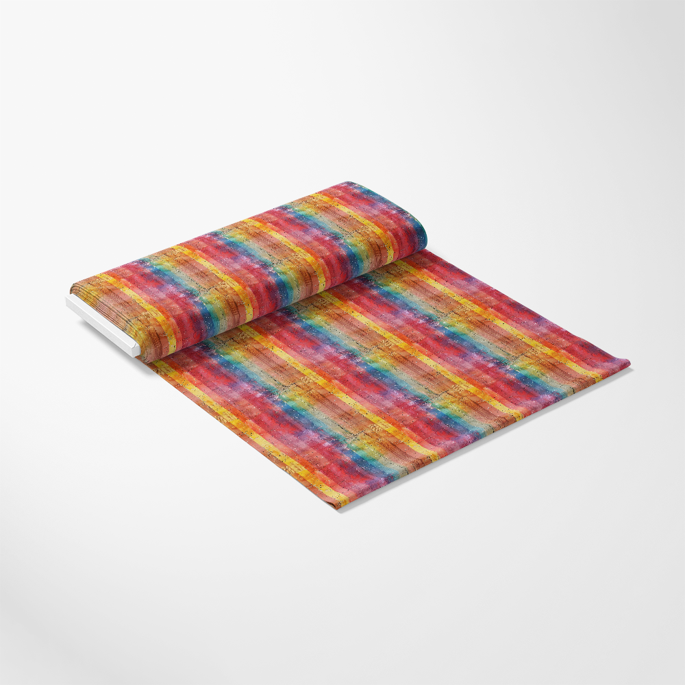 A partially unrolled roll of paper with a vibrant, multicolored striped pattern featuring red, yellow, blue, and green hues on a plain white background.
