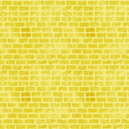 A pattern of yellow bricks arranged in a regular, horizontal layout. The bricks have a slightly uneven texture, giving the wall a hand-crafted appearance. The overall color is a bright and uniform yellow.