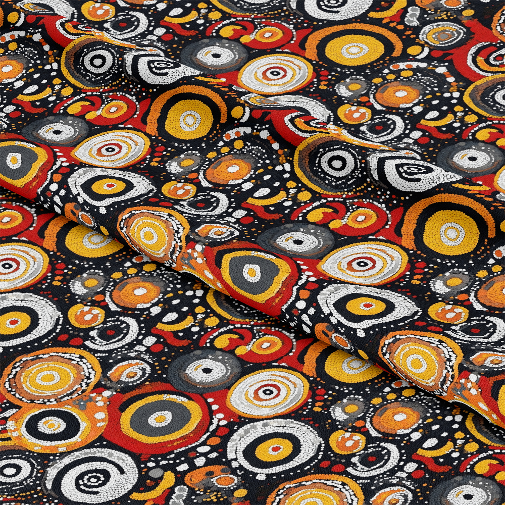 Aboriginal Circles and Dots Pattern 11 Quilting Cotton Fabric featuring circular motifs, dot designs, black background, warm tones of orange, red, yellow, white accents, traditional Indigenous inspired textile, quilting cotton material, colorful artistic print, fabric yardage for sewing projects.