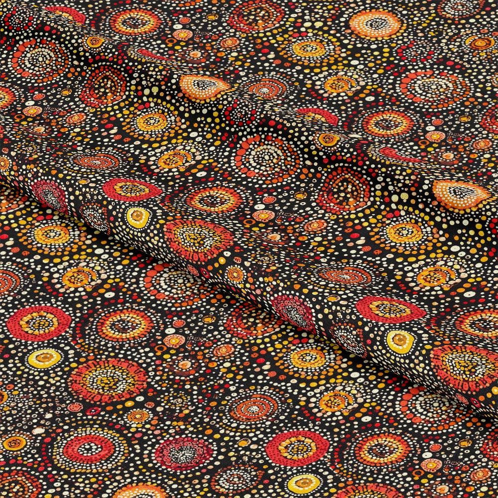 Aboriginal Circles and Dots Pattern 5 Quilting Cotton Fabric featuring black background, red, orange, yellow, and cream circular dot designs, tribal style, traditional motifs, textile material, quilting cotton, sewing fabric, crafting cloth, vibrant colors, ethnic print, premium fabric.