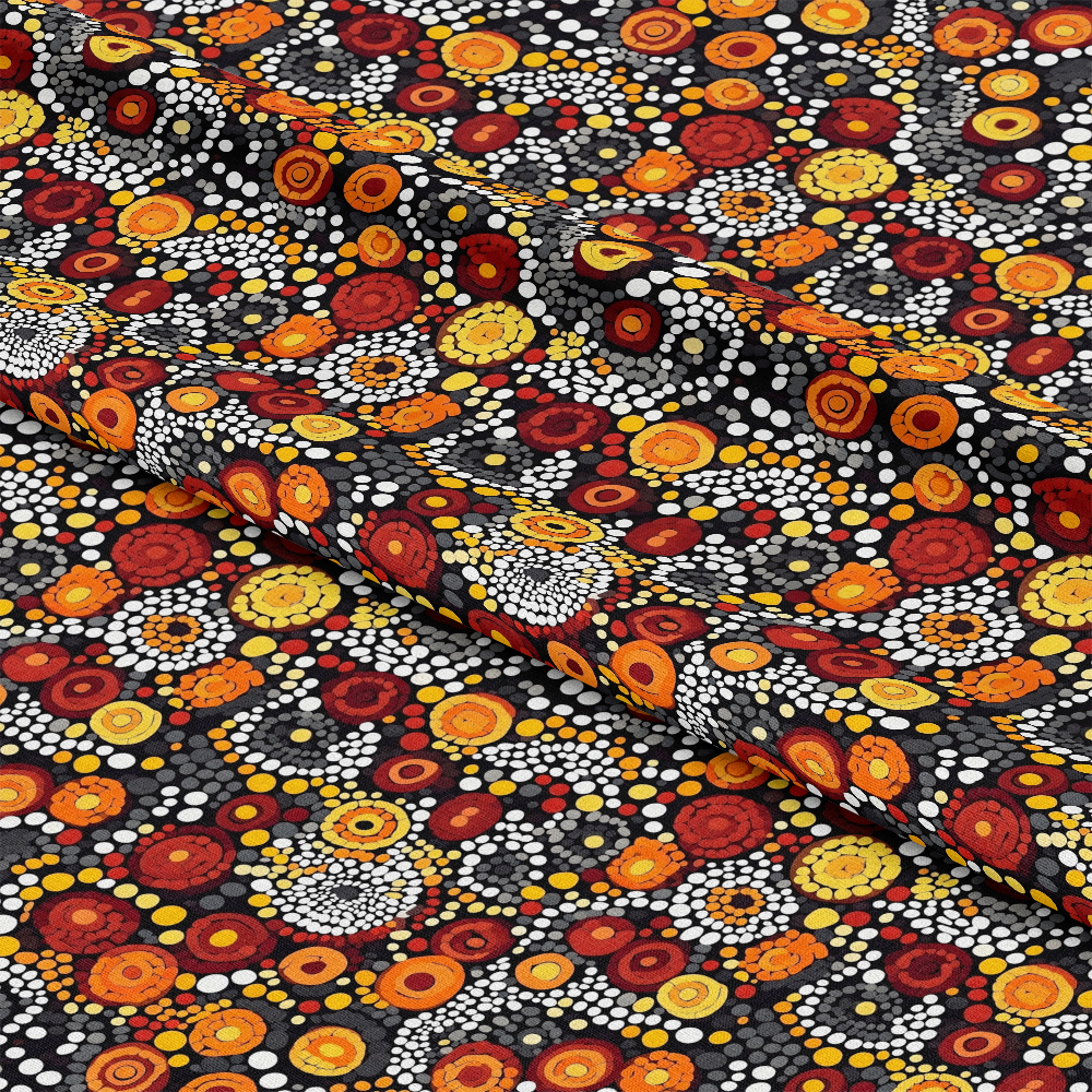 Aboriginal Circles and Dots Pattern 9 Quilting Cotton Fabric featuring vibrant orange, yellow, red, white, and black colors, circular and dot motifs, traditional style, quilting textile, soft cotton material, colorful fabric design, craft fabric, sewing material.