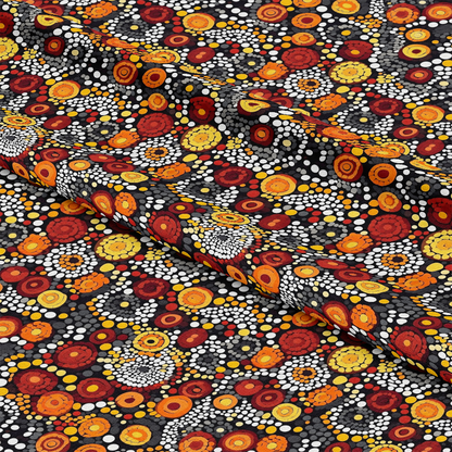 Aboriginal Circles and Dots Pattern 9 Quilting Cotton Fabric featuring vibrant orange, yellow, red, white, and black colors, circular and dot motifs, traditional style, quilting textile, soft cotton material, colorful fabric design, craft fabric, sewing material.