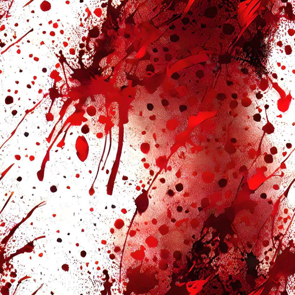 Red and black paint splatters on a white background, creating an abstract and chaotic pattern.