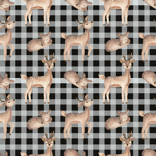 Pattern of illustrated deer on a black and white checkered background. Some deer are standing, and others are lying down.