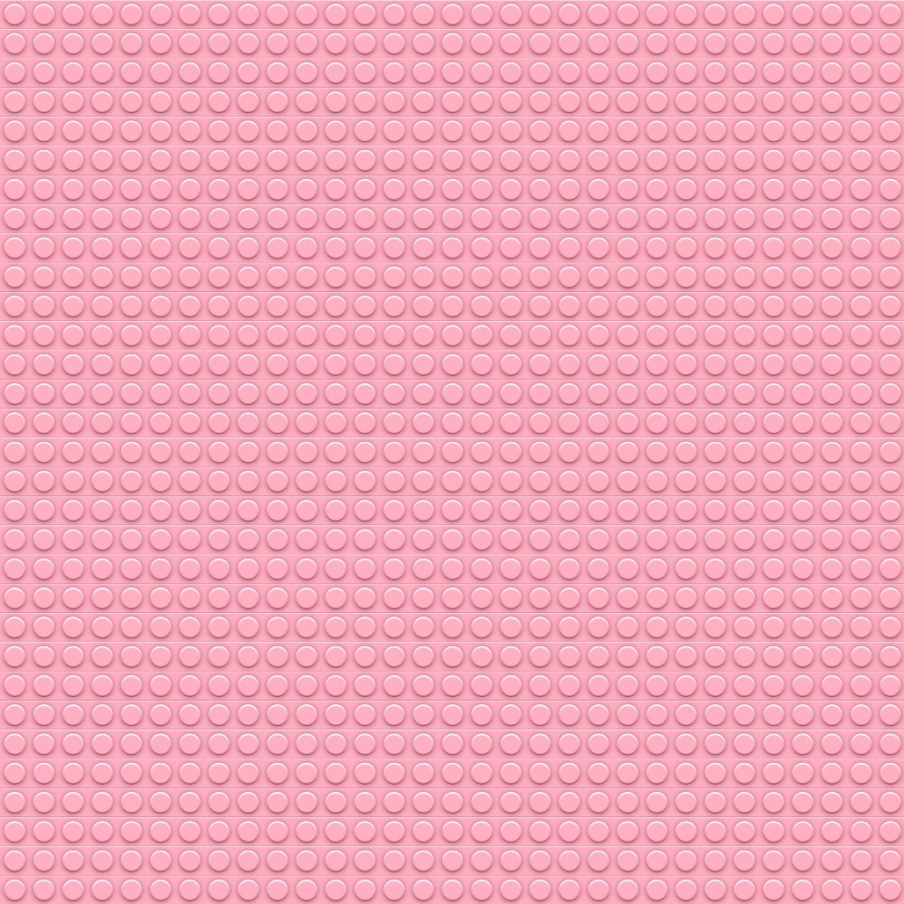 Pink rubber mat with a circular pattern of small raised dots evenly distributed across the surface.