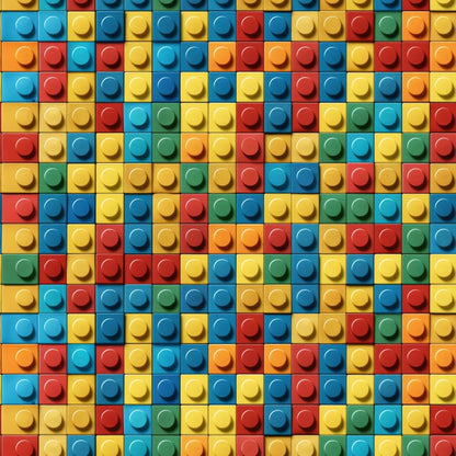 A colorful pattern of interlocking plastic toy bricks in red, blue, yellow, and green, forming a grid-like arrangement.