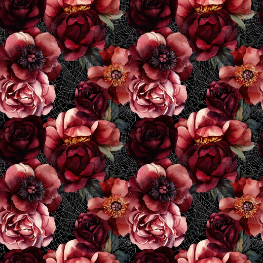 Pattern of red and pink flowers with dark green leaves on a black background.