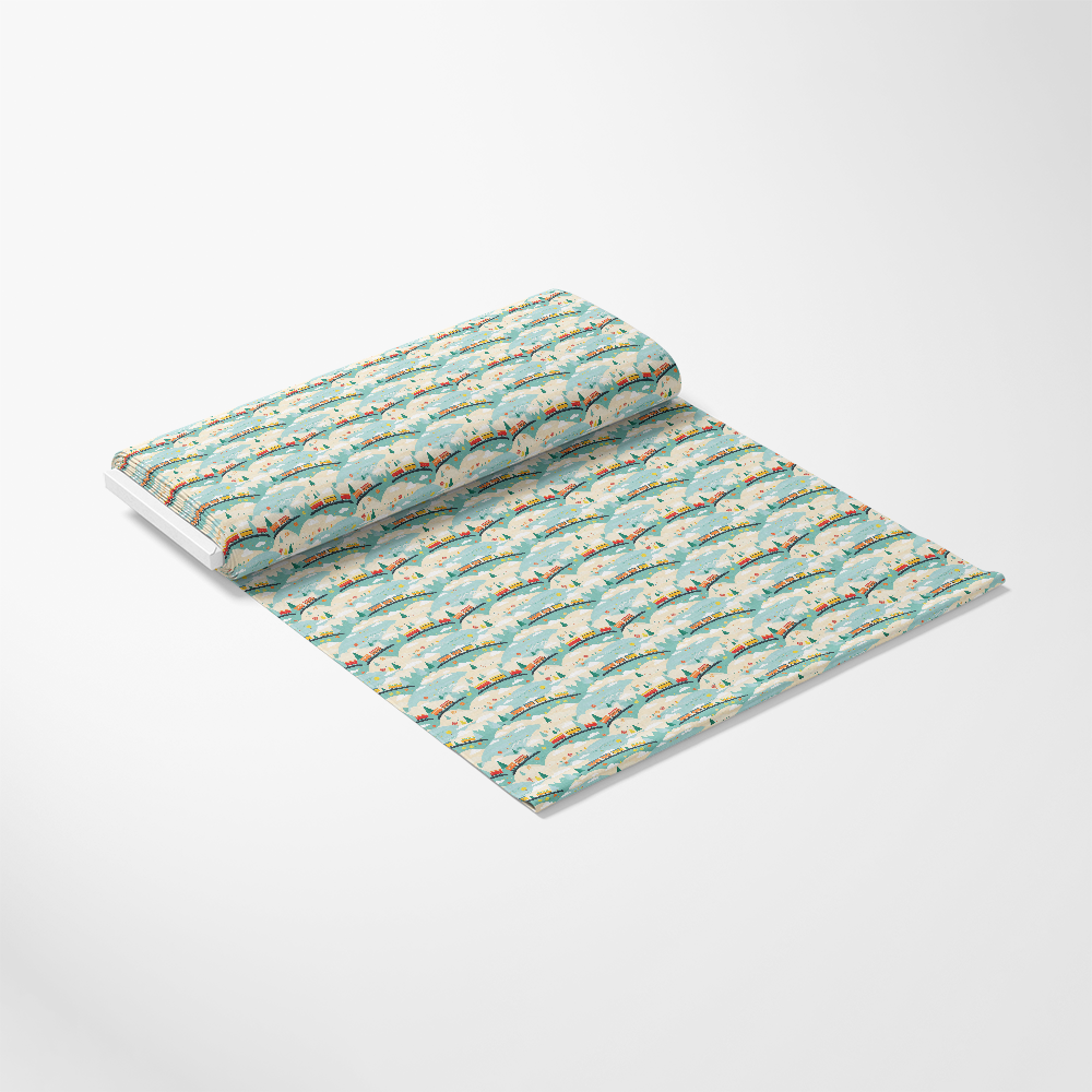 A roll of light blue fabric with a repeating pattern of illustrated people sunbathing under red and yellow umbrellas, partially unrolled on a white surface.