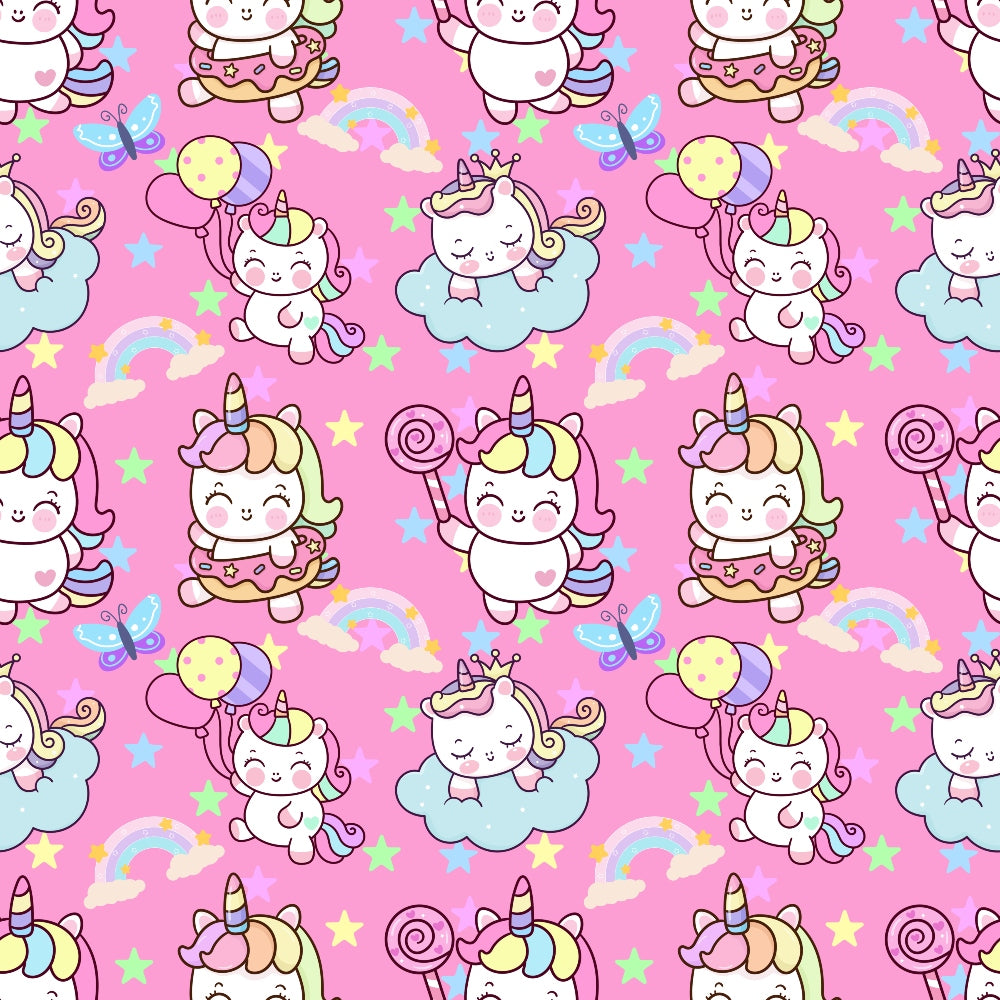 Pattern of cute unicorns, rainbows, stars, and clouds with balloons and lollipops on a pink background.