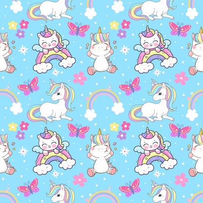 Pattern of cartoon unicorns, rainbows, butterflies, and flowers on a light blue background.