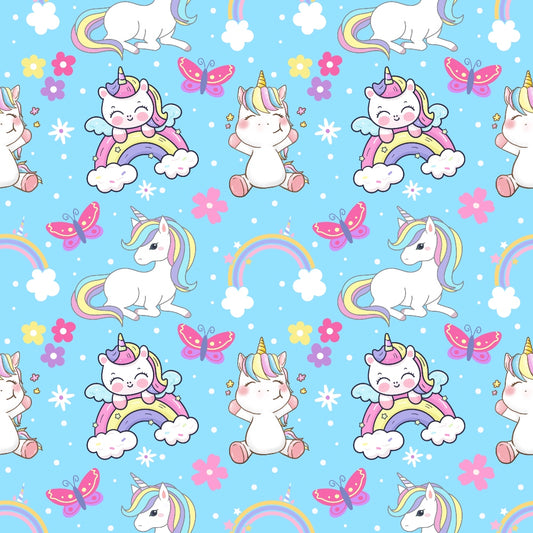 Pattern of cartoon unicorns, rainbows, butterflies, and flowers on a light blue background.