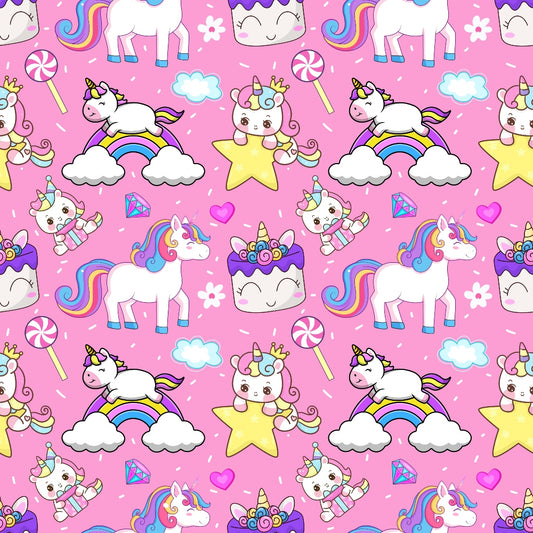 Cartoon unicorns, rainbows, cakes, and stars in a colorful, repeating pattern on a pink background.