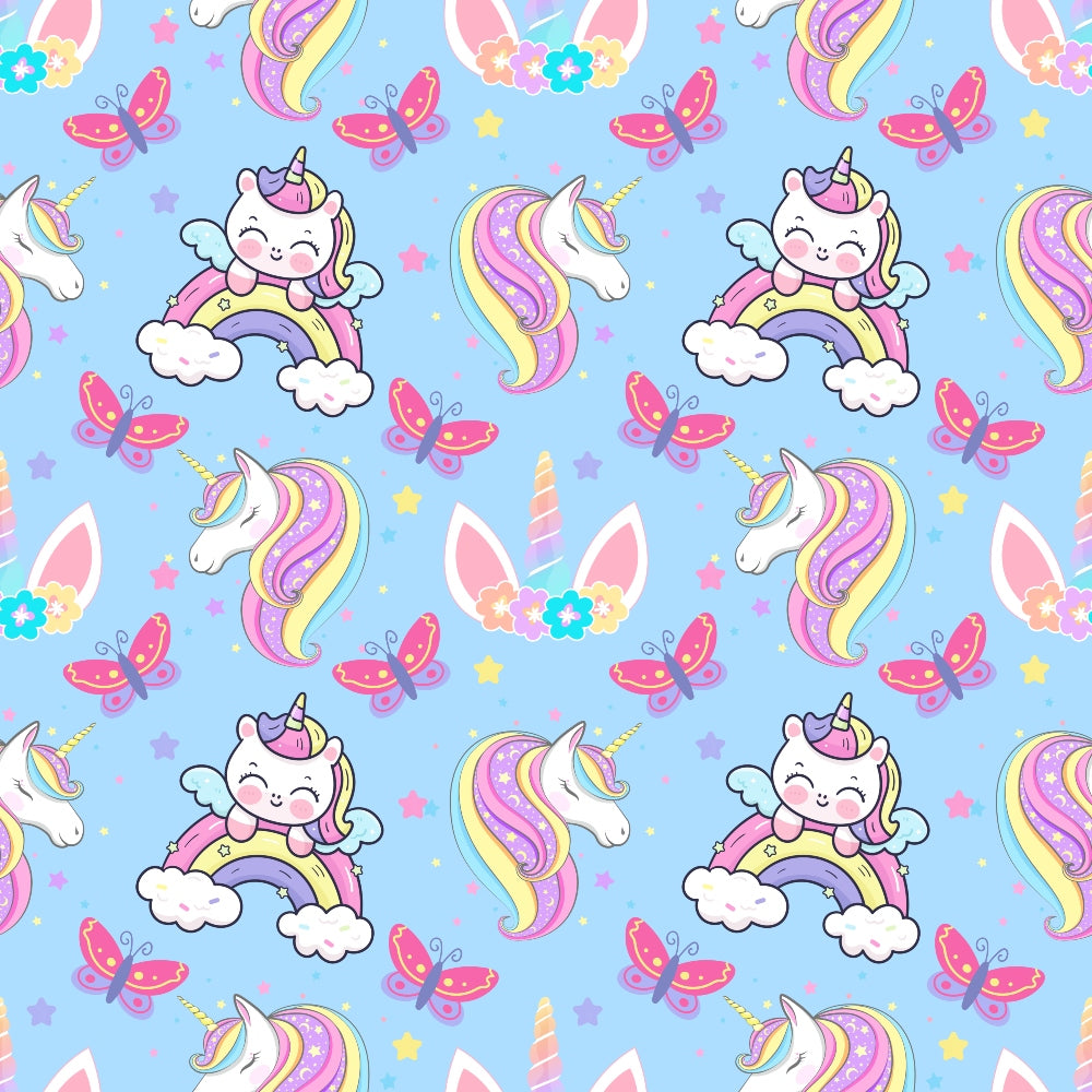 Pattern of colorful unicorns, rainbows, butterflies, and stars on a blue background.