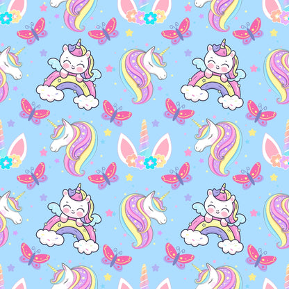 Pattern of colorful unicorns, rainbows, butterflies, and stars on a blue background.