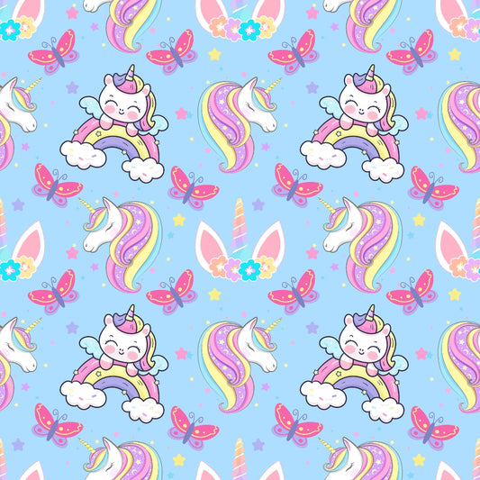 Pattern of colorful unicorns, rainbows, butterflies, and stars on a blue background.