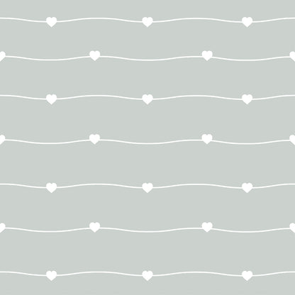 A pattern of white hearts on wavy lines against a light green background.