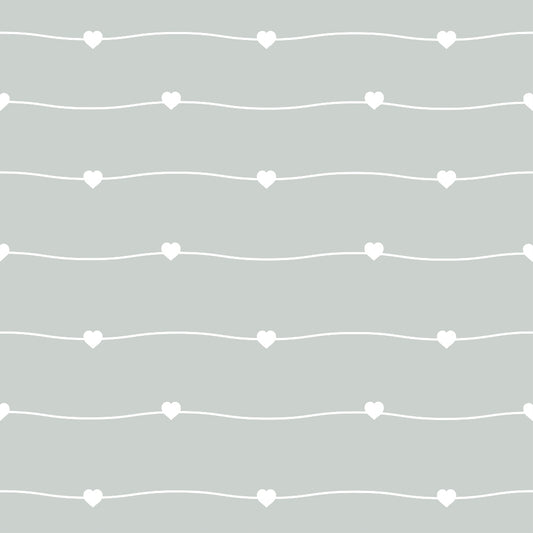 A pattern of white hearts on wavy lines against a light green background.