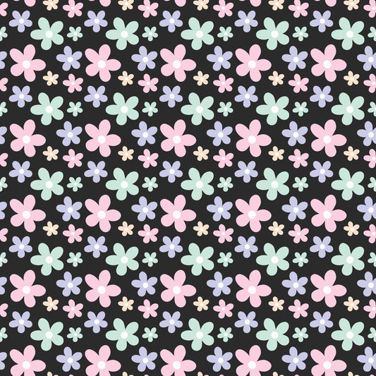 Pattern of pastel-colored flowers in pink, blue, and green on a black background. Various sizes are evenly distributed across the image.