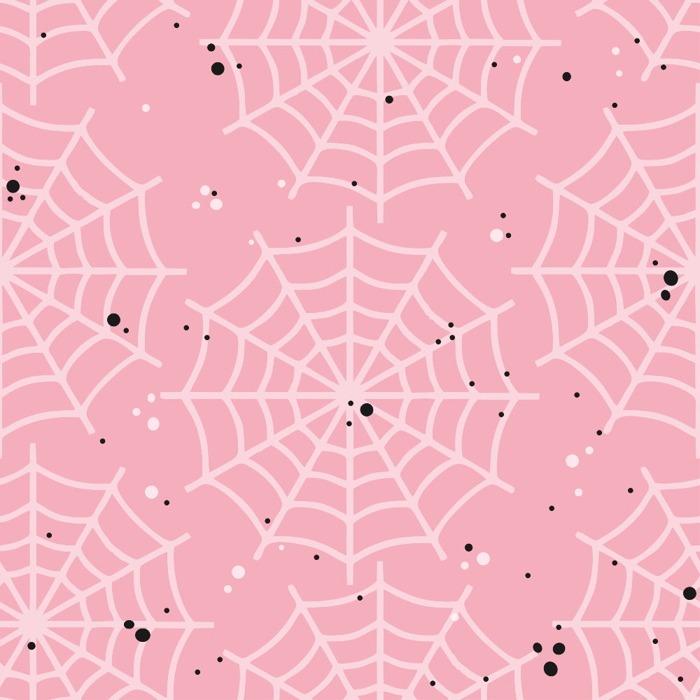 Pink background with a pattern of white spider webs and scattered black dots.