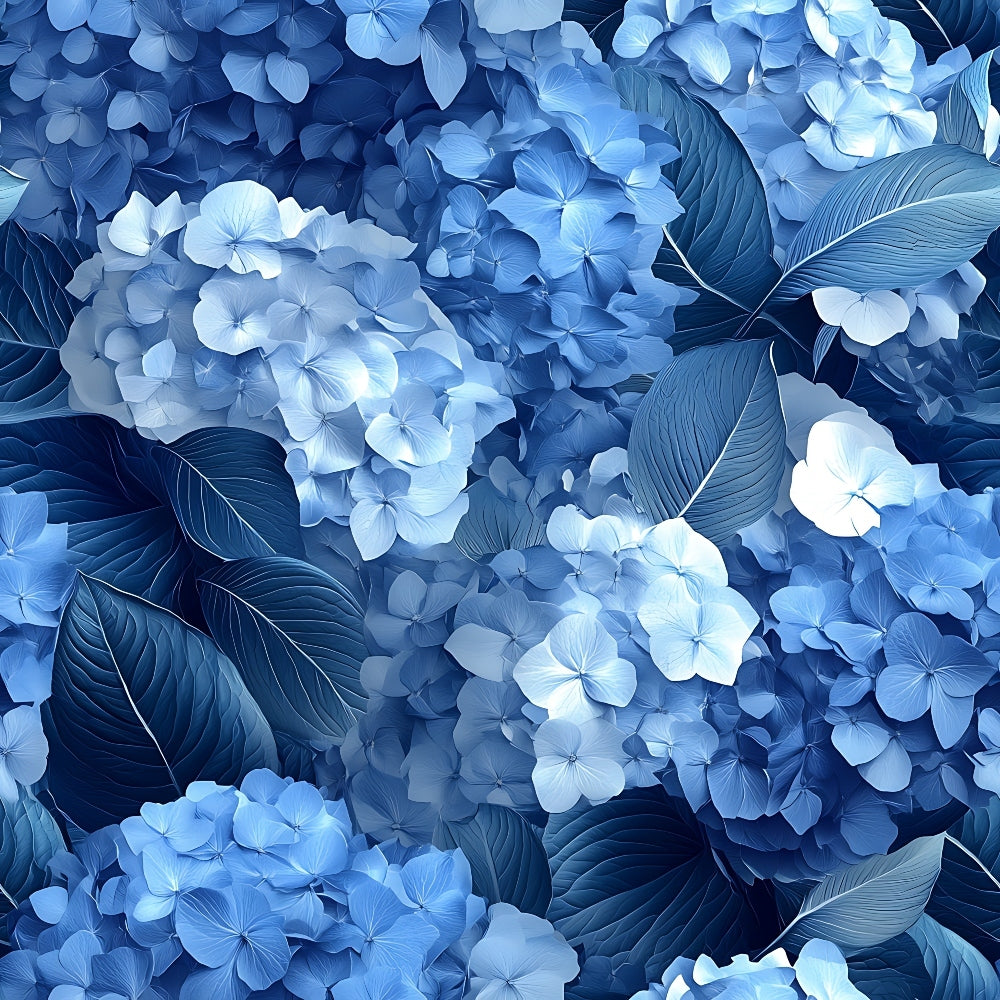 Blue hydrangea flowers densely clustered with green leaves surrounding them.