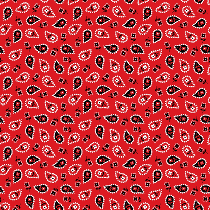 Red paisley pattern with black and white teardrop shapes and small floral motifs, repeating symmetrically across the design.