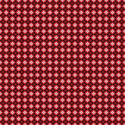 A red and black symmetrical geometric patterned fabric with circular and star-like designs repeating across the surface.