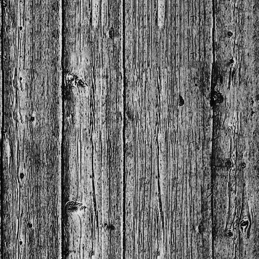 Weathered wooden planks with vertical grain patterns and visible knots, in grayscale.