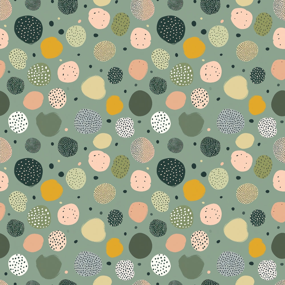 Abstract pattern of variously colored and textured circles on a green background.