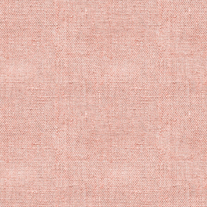 Close-up of a textured pink fabric, showcasing a woven pattern with a subtle grid design.