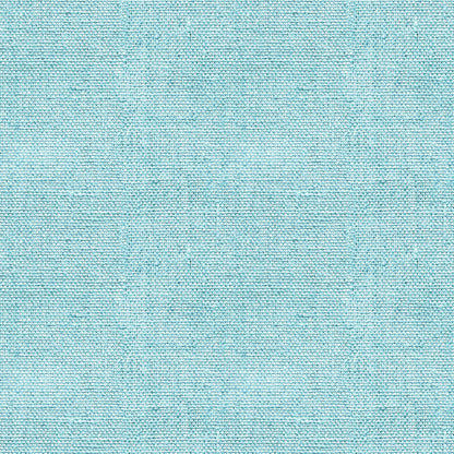 Light blue textured fabric with a subtle grid-like pattern fills the frame.