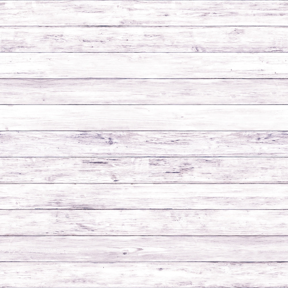 A whitewashed wooden plank wall with horizontal boards, showing a rustic texture and light weathering.