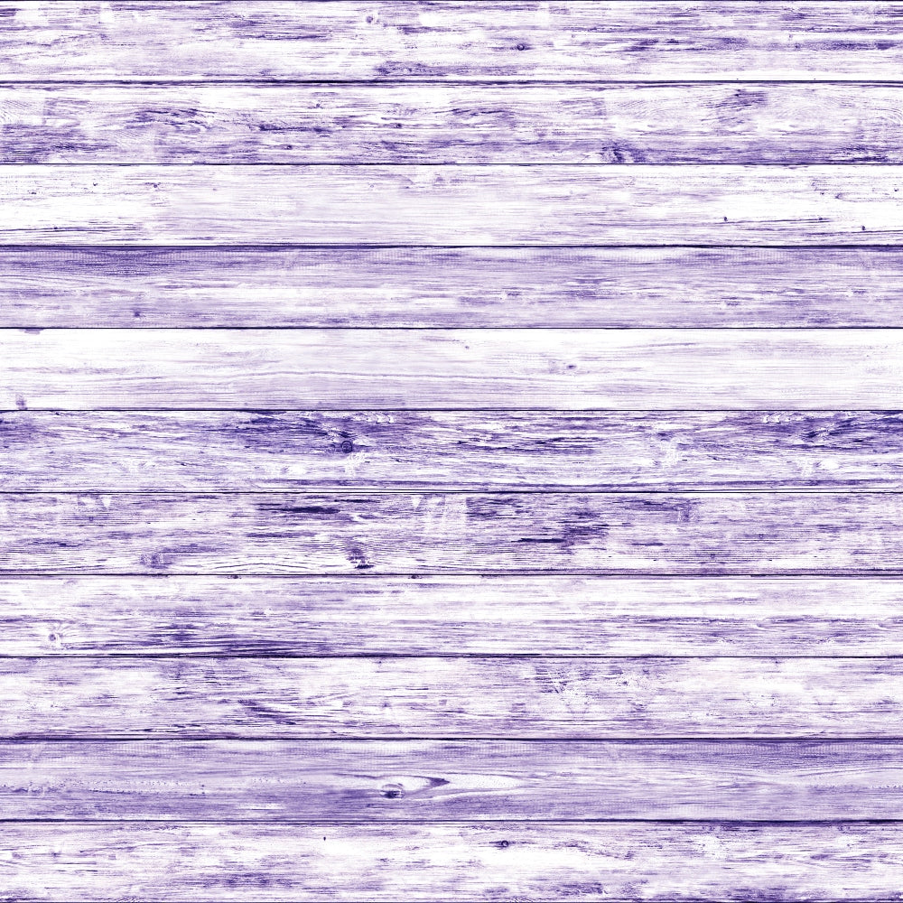 A textured wooden surface painted in a light purple hue with visible grain patterns and horizontal planks.