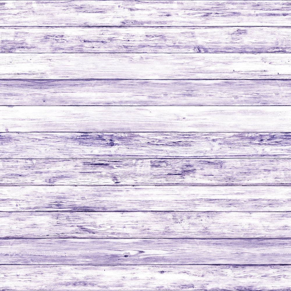 Wooden planks with a distressed, light purple finish aligned horizontally, showing texture and grain variations.