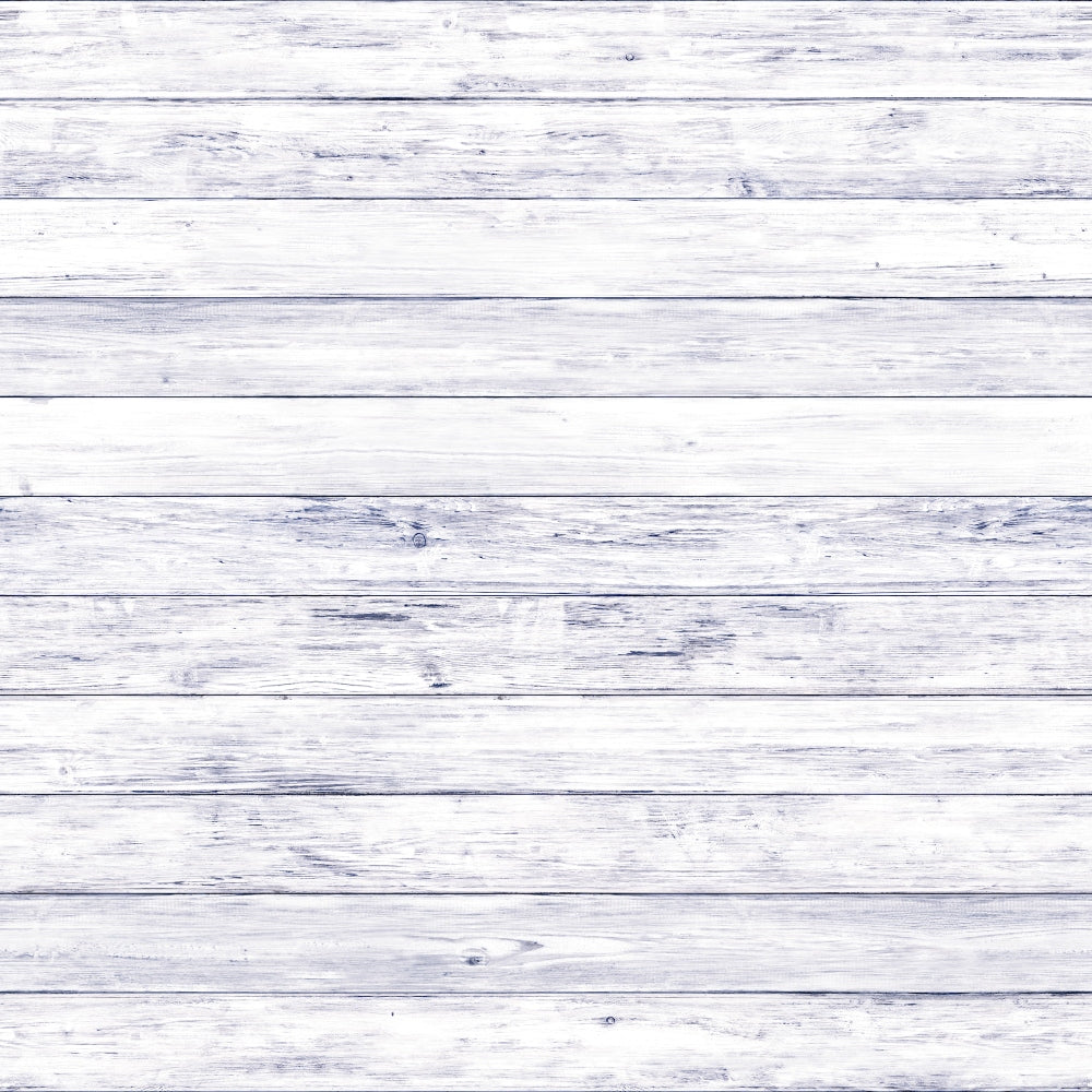 Whitewashed wooden planks arranged horizontally, showing a rustic texture and subtle grain patterns.