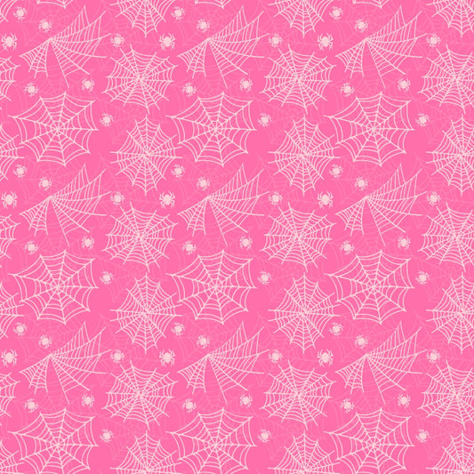 Pattern of white spider webs and small spiders on a pink background.