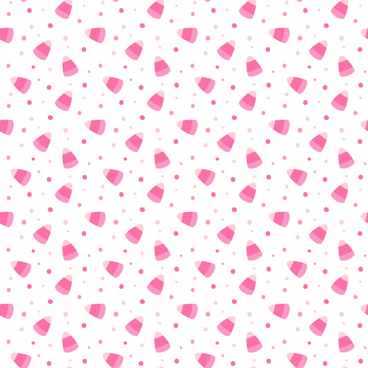 A pattern of pink candy corn and small pink dots scattered on a white background.