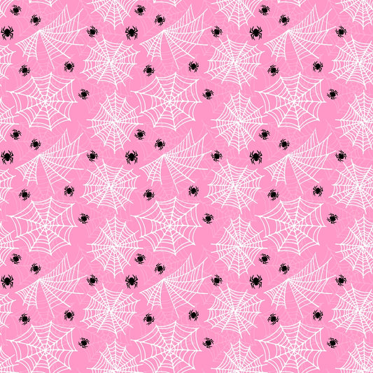 Pattern of white spiderwebs and black spiders on a pink background.