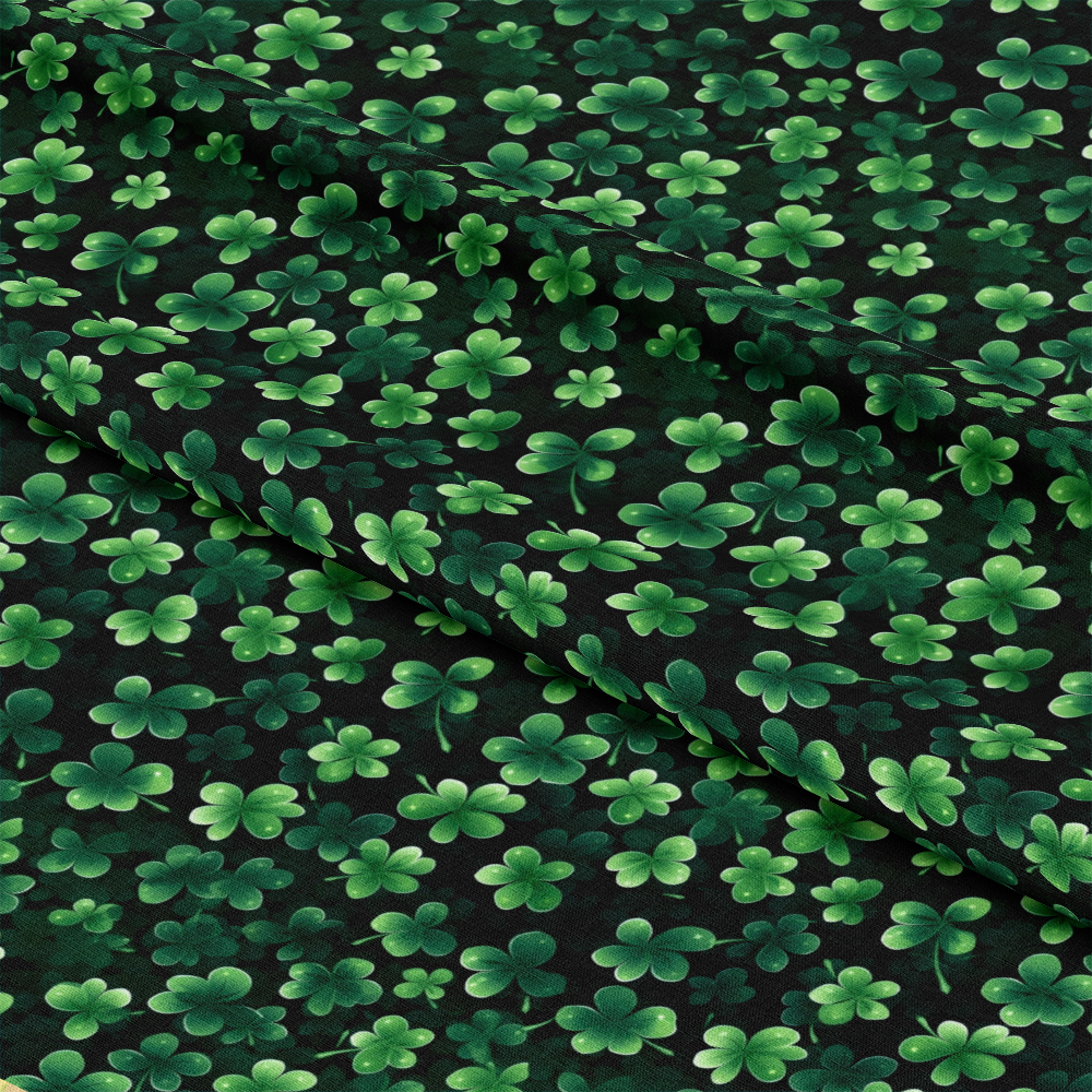 - St. Patrick's Day Glam Pattern 5 Quilting Cotton Fabric  
- green shamrocks cloverleafs  
- emerald lime forest tones  
- holiday festive textile material  
- soft smooth quilting cotton  
- black background contrast  
- botanical foliage design  
- Irish luck-themed fabric  
- nature inspired repeat print