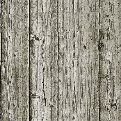 Wooden planks aligned vertically, showing a weathered texture with visible knots and grain patterns. The color is a muted grayish-brown, suggesting age and exposure to elements.