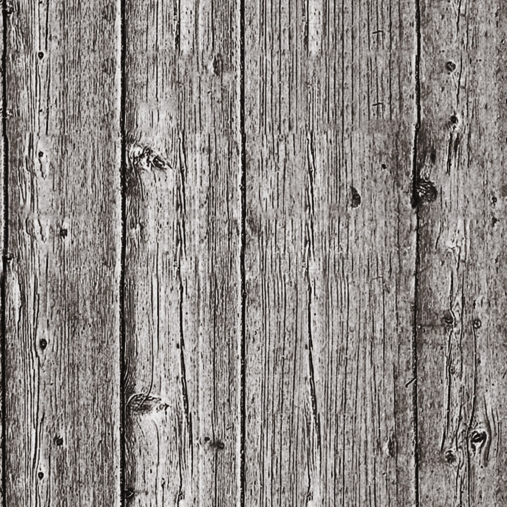 Close-up view of a weathered wooden surface with vertical planks, showing grain patterns and knots. The texture is rough and aged.