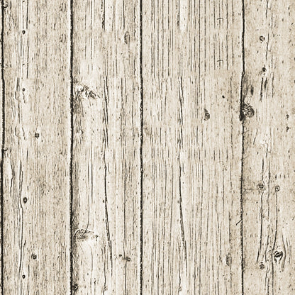 Close-up of an aged wooden plank surface with visible grain and knots. The wood is vertically aligned, showing natural texture and weathering.