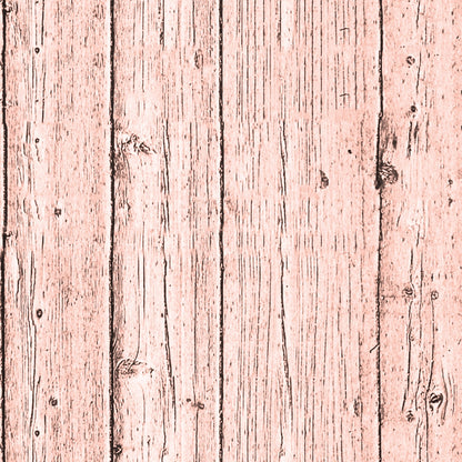 Weathered wooden planks with a light pink hue and visible knots and grain.