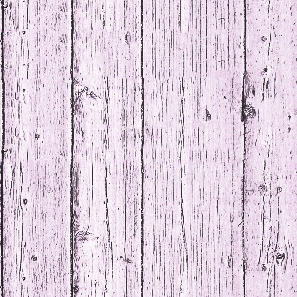 Close-up of vertical wooden planks with a weathered texture. The wood has a light, pinkish hue and visible grain patterns.