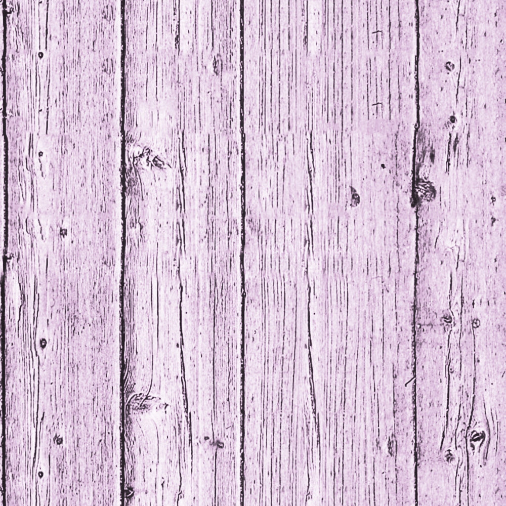 A wooden plank surface with a faded purple tint, showing vertical lines and noticeable grain patterns.