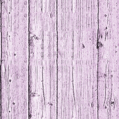 A wooden plank surface with a faded purple tint, showing vertical lines and noticeable grain patterns.