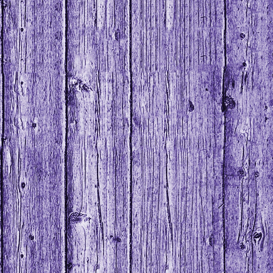 Close-up of a wooden fence with vertical planks painted purple, showing wood grain and knots.