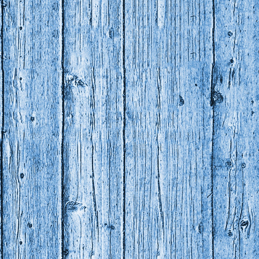 Blue-toned wood planks with visible grain and knots run vertically, creating a textured pattern resembling a weathered surface.