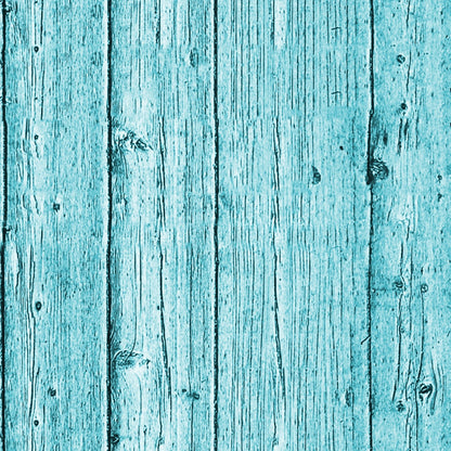 A textured turquoise wooden plank surface with visible grain and knots.