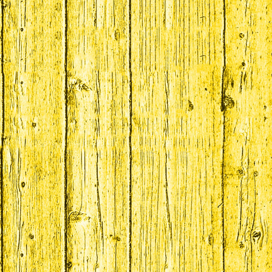 Vertical wooden planks with a yellow tint, showing natural grain and knots.