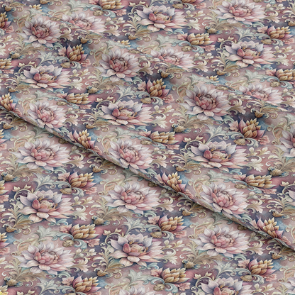 A close-up of fabric featuring a repeating floral pattern with large pastel flowers, leaves, and vines in shades of pink, purple, and green on a light mauve background. The fabric is shown with gentle folds.